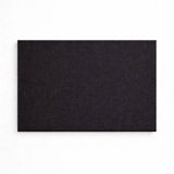 Black rectangular mat on a white background